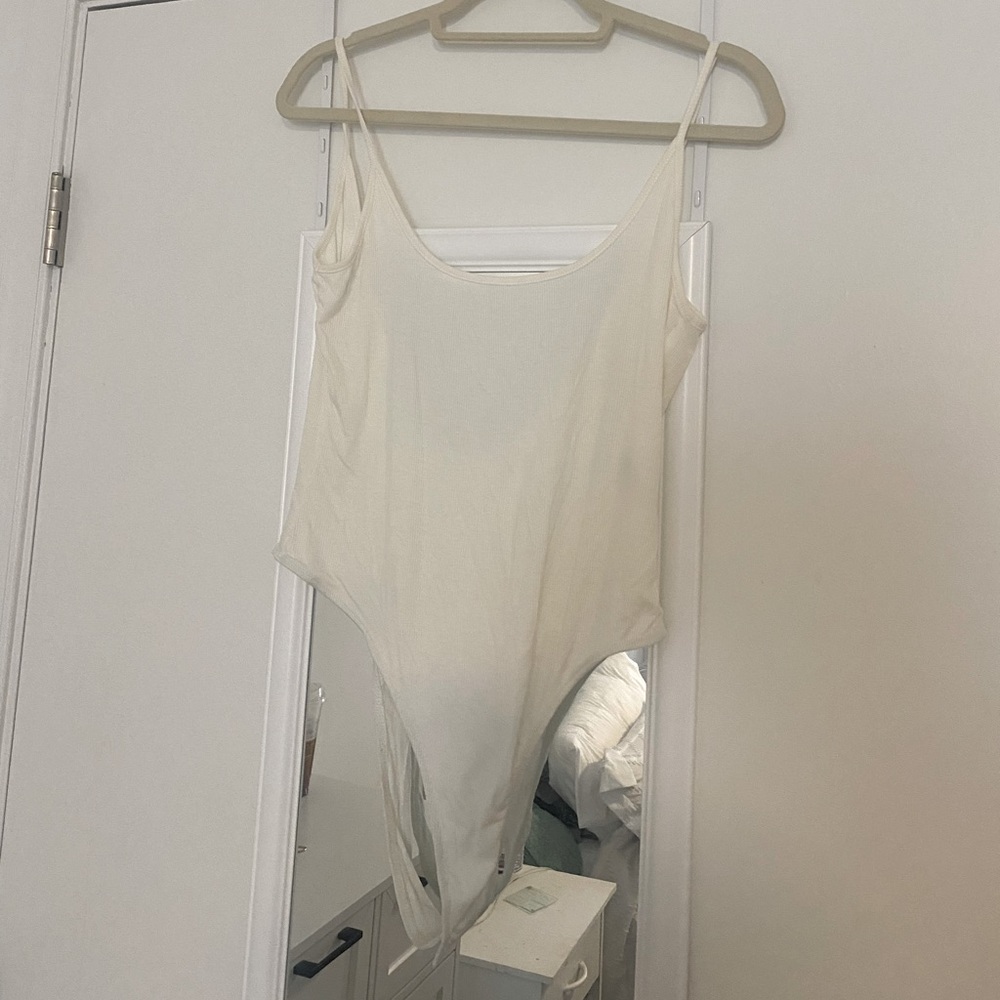 White body suit~ never been worn!